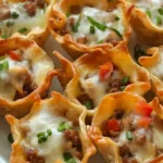 Cheesy Sausage Wonton Cups