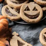 Milk Chocolate Stuffed Jack-O’-Lantern Cookies