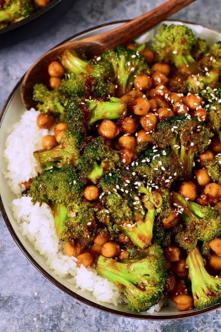 A vibrant garlic broccoli stir fry with chickpeas and rice, showcasing a healthy vegan meal.