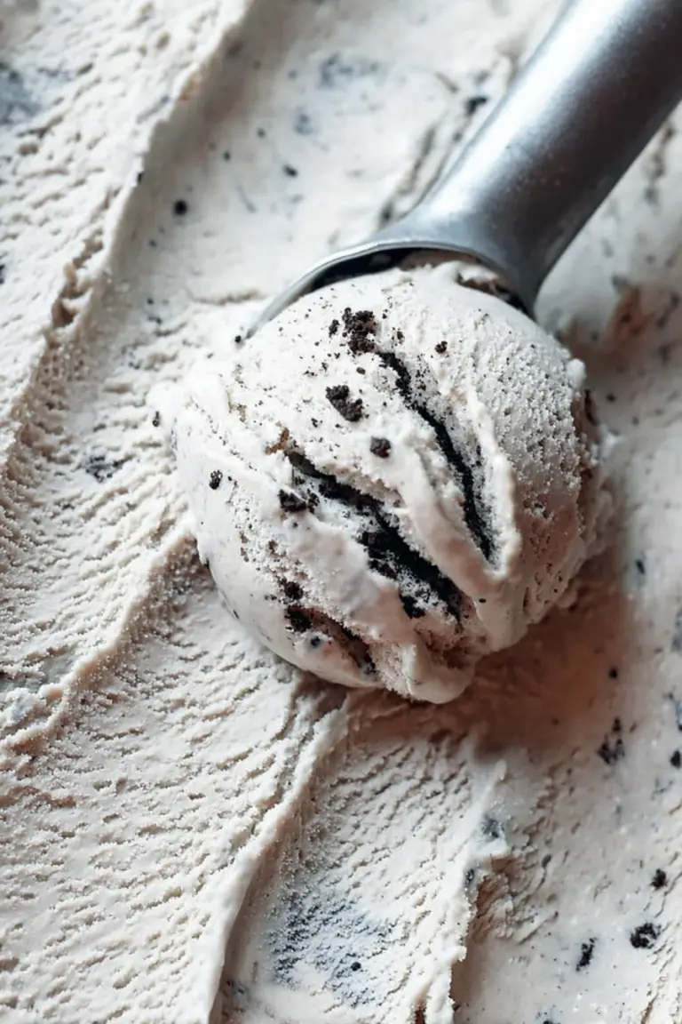 Delicious cookies and cream ice cream in a bowl with crushed Oreo cookies on top