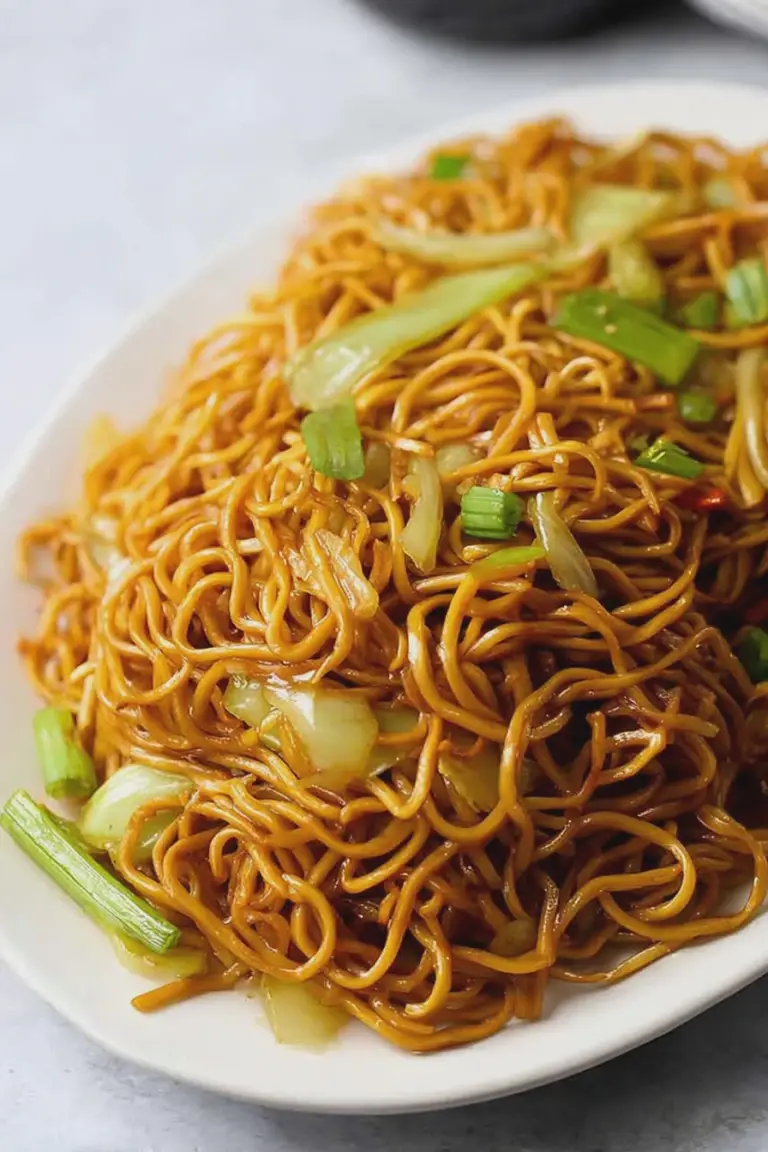 Delicious homemade Panda Express chow mein served on a plate, featuring chow mein noodles and colorful vegetables.