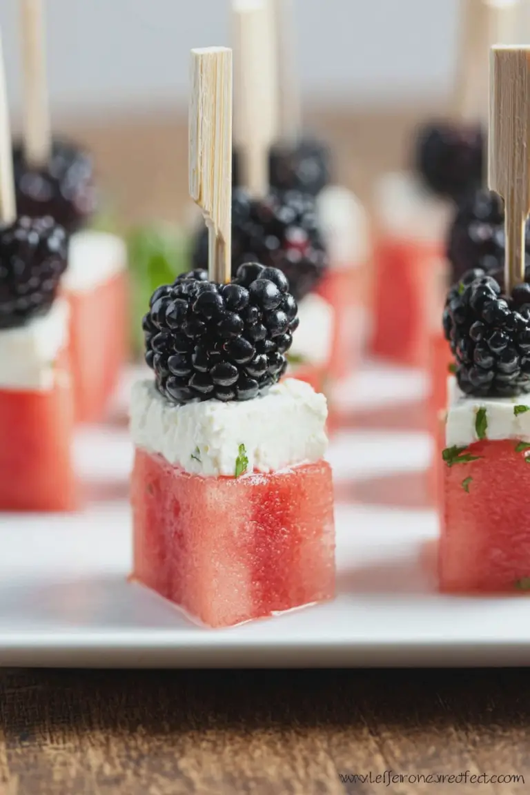 Colorful watermelon feta blackberry skewers on a platter, perfect for summer entertaining.